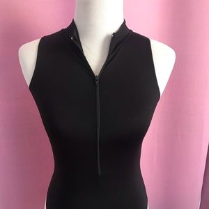 A beautiful black zip up leotard